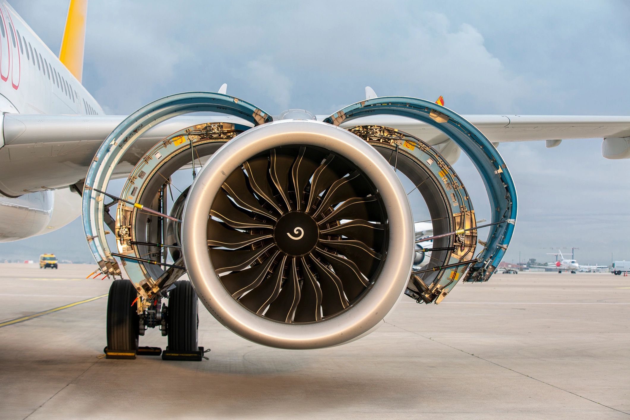 Close-up of aircraft jet engines on tarmac